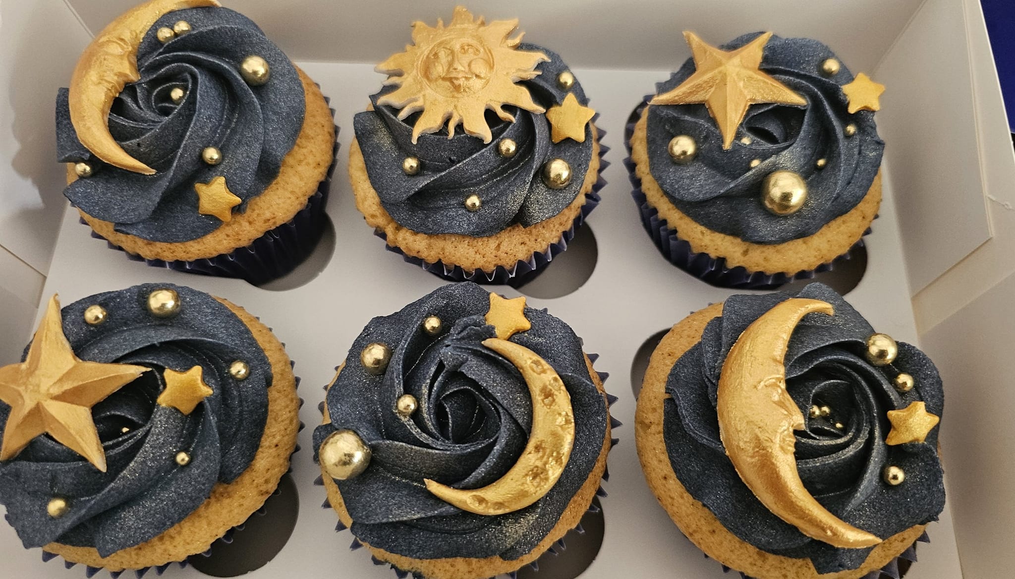 Black and gold celestial themed cupcakes by Hayley's Cupcakes