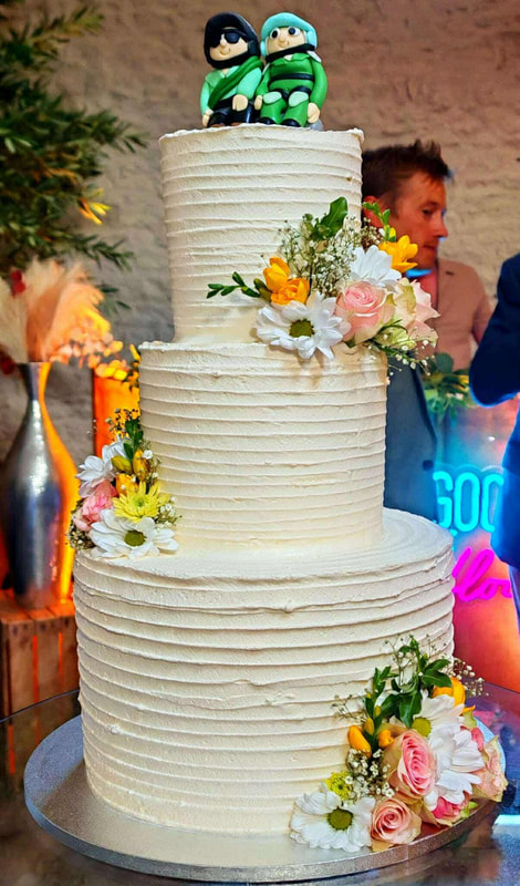 3 tier wedding cake with vanilla, lemon & chocolate sections hayleys cupcakes henley